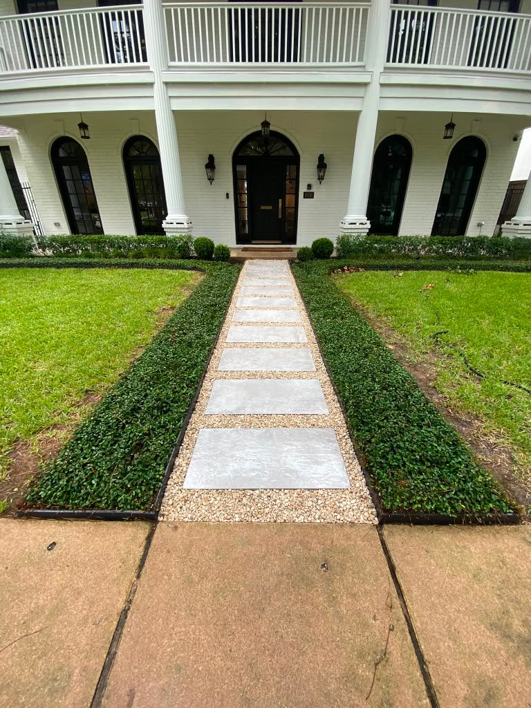 Completed walkway landscaping project by Rainlandscaping